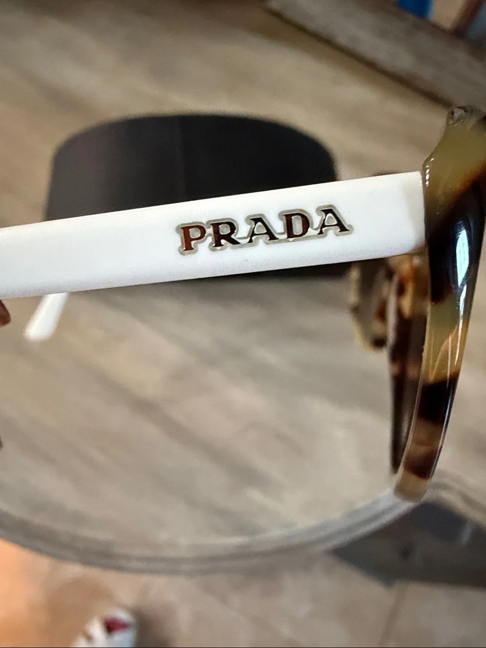 Prada White Tortoiseshell Sunnies  . Excellent cond. w/ case